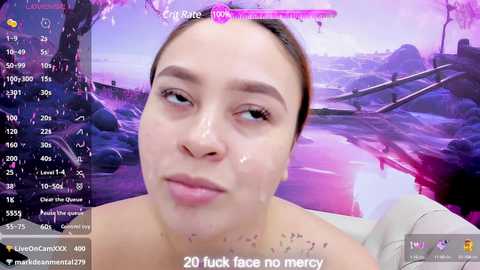 Video of a light-skinned woman with brown hair, wet with water, smiling, in a virtual reality game with a pink and purple underwater theme, text overlay: \"20 to face no mercy.\