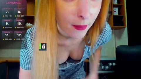 A video of a fair-skinned woman with long blonde hair, wearing a blue-and-white checkered dress, and red lipstick, in a modern kitchen. A \"Loververse\" app interface overlays the image with chat and stats.