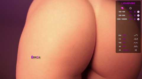 Media: A close-up video of a light-skinned person's bare buttocks with a small purple sticker reading \"DONGA\" on the left cheek. The background is a dark, gradient purple.