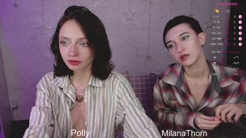 Video of two women in casual attire: Polly, left, wearing striped shirt, and Milana Thom, right, in plaid shirt.