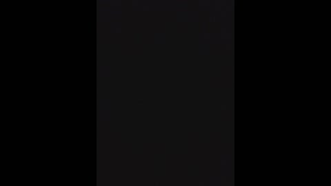 Video of a dark, black rectangle with a subtle, barely discernible vertical gradient, set against a completely black background. The image has a minimalist, abstract aesthetic.