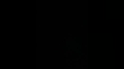 A video featuring a completely black background with no discernible objects, textures, or details, creating a void effect. The image is entirely devoid of light or color, emphasizing emptiness and absence.