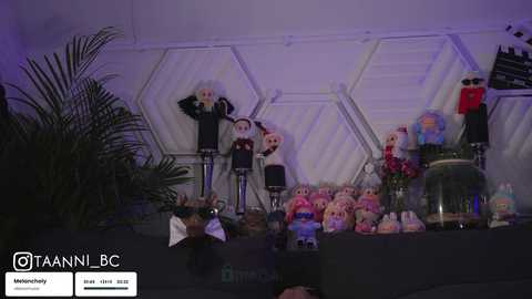 Video of a plush toy display featuring characters from \"Re:Zero kara Hajimeru Isekai Seikatsu\" set against a hexagonal white wall.