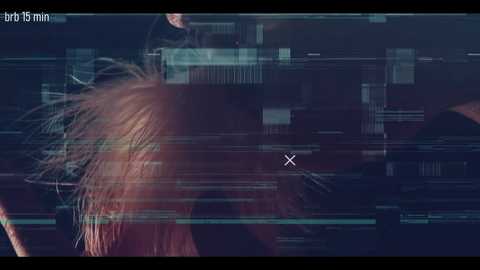 A digitally altered video with a glitchy overlay, depicting a blonde woman with shoulder-length hair and a blurred, pixelated face, set against a dark, abstract background with multiple horizontal lines.