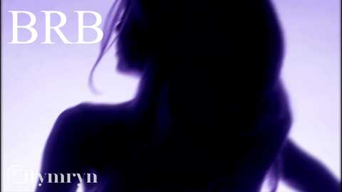 A digital video with a silhouetted, nude woman facing away, her long hair flowing. The background is a gradient of purple and white. Text reads \"BB\" in large white letters at the top left, and \"MADONNA\" in smaller white letters at the bottom left.