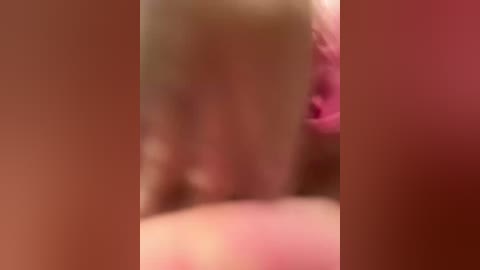 Blurry video of a close-up, intimate scene with indistinguishable figures and muted colors, possibly depicting sexual activity.