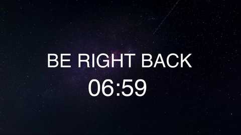 Video of a dark, star-filled night sky with a digital overlay of white text: \"BE RIGHT BACK 06:59.\" The text is centered and bold, with a clean, modern font.