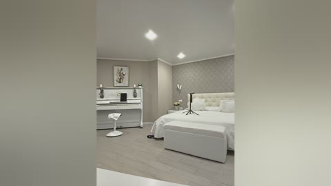Modern, minimalist bedroom with white walls, a queen-sized bed with a tufted headboard, a white desk, and a modern white stool. The room has soft, ambient lighting and a light wood floor.