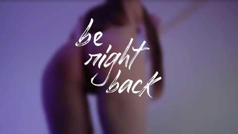 A blurred video of a person with long hair, possibly a woman, leaning forward. The background is a gradient of purple to white. Text in white cursive reads, \"Be right back.\