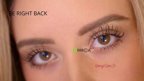 A close-up video of a woman's eye with a natural, defined brow, showcasing light brown hair. Text overlays instruct to \"BE RIGHT BACK\" and \"DM @Dermacare.\