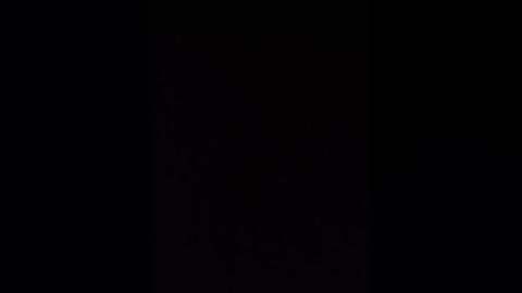 A video of a black background with no discernible objects or details, creating a stark, minimalist composition. The image is devoid of any color or texture, emphasizing the pure, unadulterated blackness.